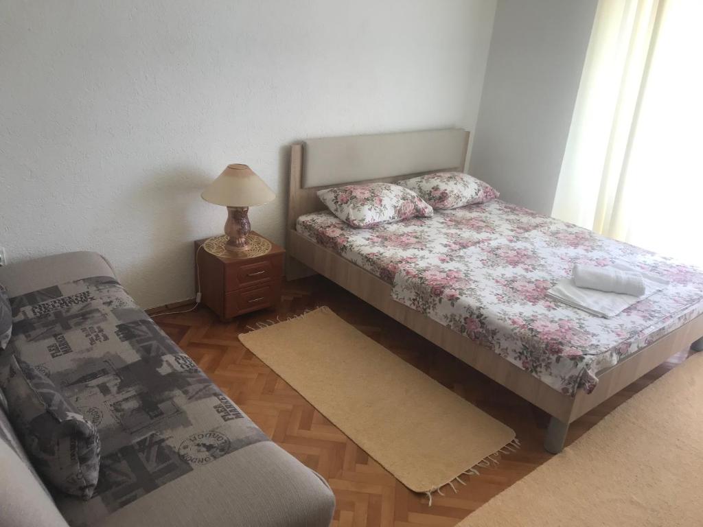 Postel nebo postele na pokoji v ubytování Tina Rooms