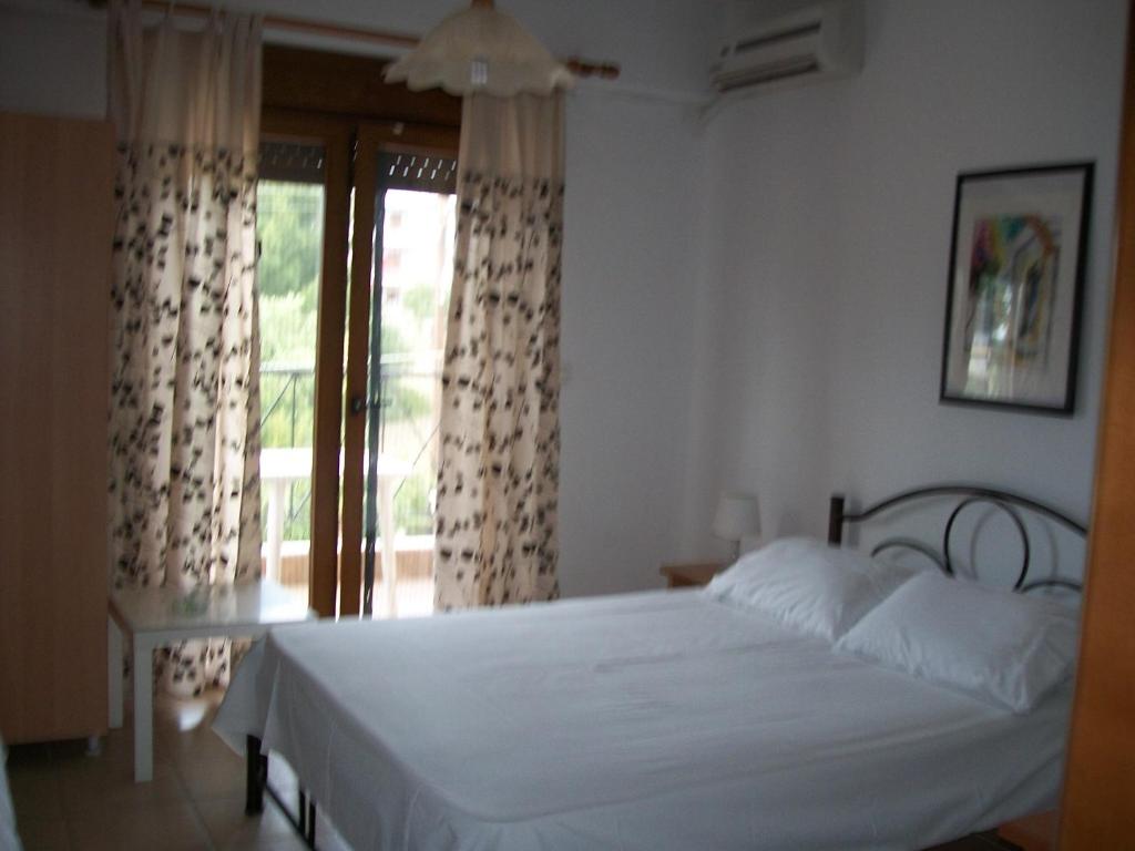 A bed or beds in a room at Paschalia ser view studios