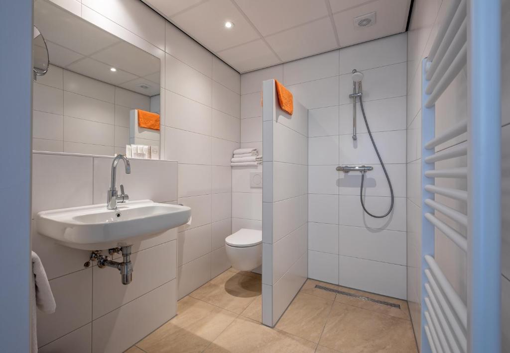 Koupelna v ubytování Hotel de Branding