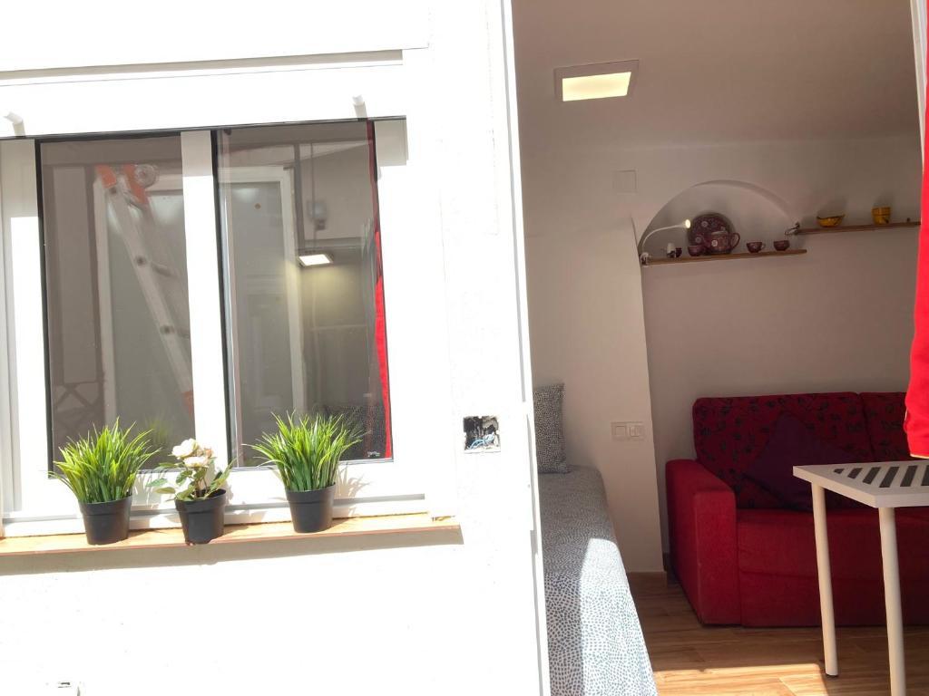Część wypoczynkowa w obiekcie Malagueña Salerosa "Apartamento - estudio con terraza" En casa típica de 1 a 4 dormitorios