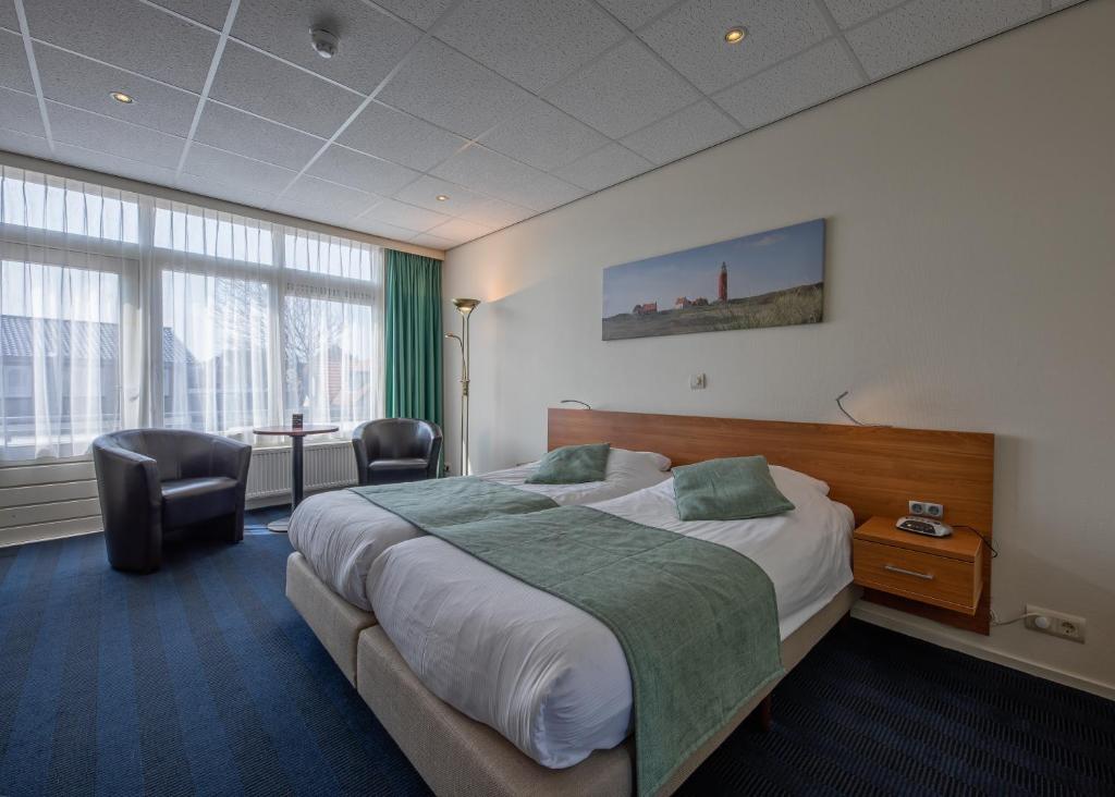 Postel nebo postele na pokoji v ubytování Hotel de Branding