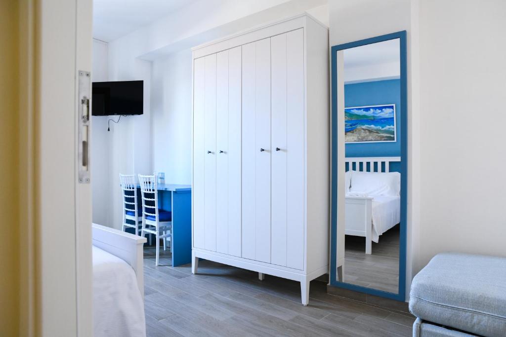 Postel nebo postele na pokoji v ubytování Signora Tita B&B Chianalea - Scilla