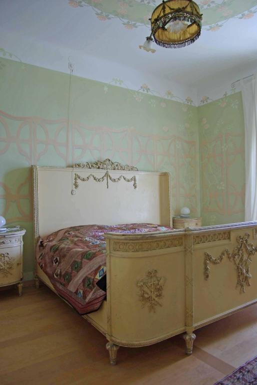 Postel nebo postele na pokoji v ubytování Bed and Breakfast Casa Locarno