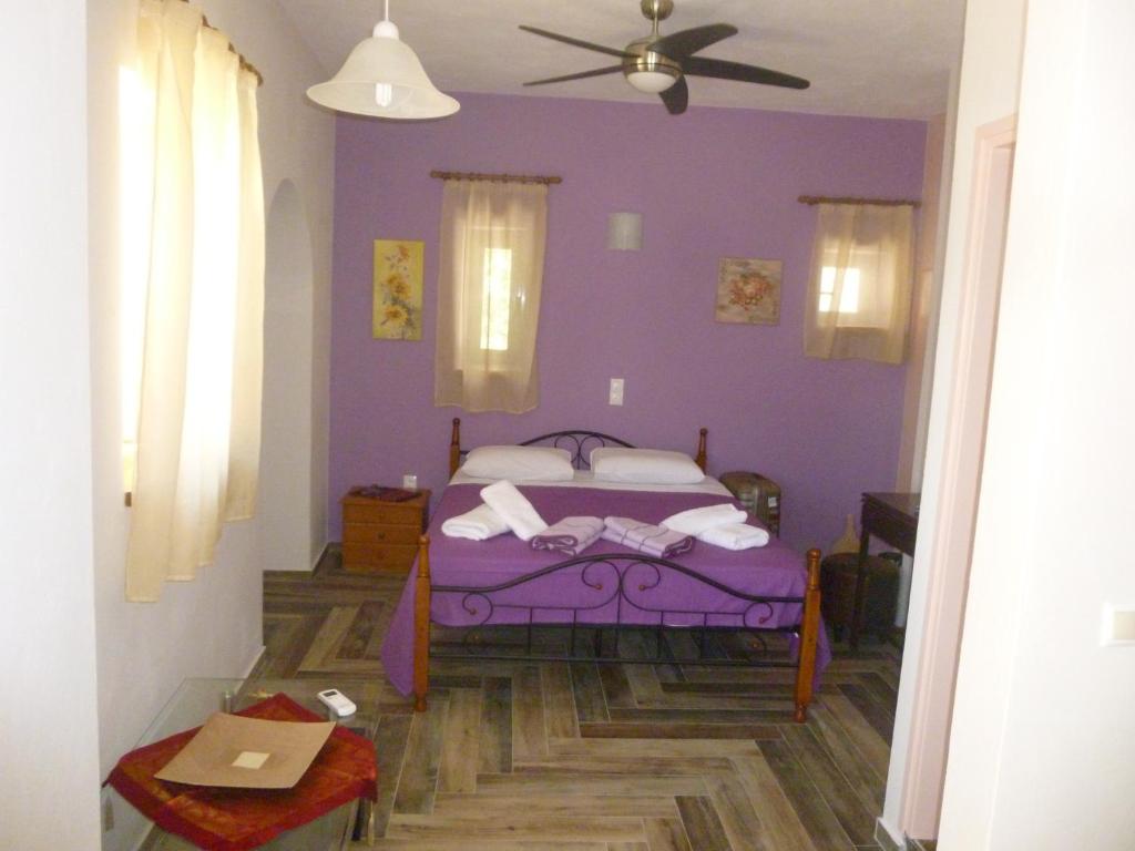 Postel nebo postele na pokoji v ubytování Katafigio Village