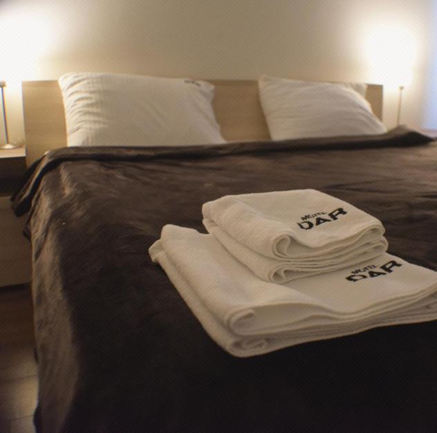 Postel nebo postele na pokoji v ubytování Motel & Restaurant Dar