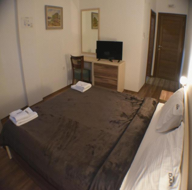Postel nebo postele na pokoji v ubytování Motel & Restaurant Dar
