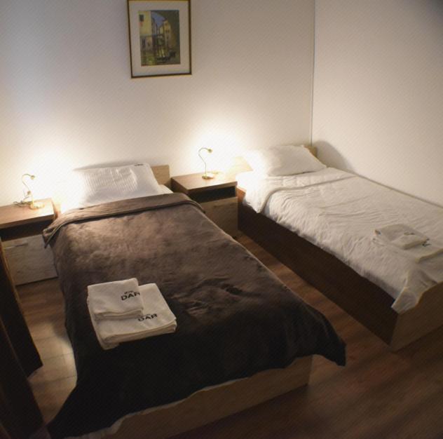 Postel nebo postele na pokoji v ubytování Motel & Restaurant Dar