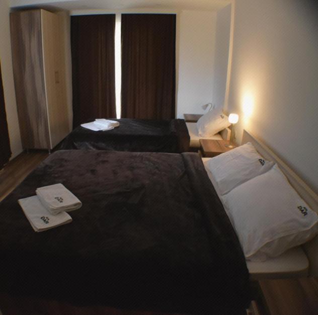 Postel nebo postele na pokoji v ubytování Motel & Restaurant Dar