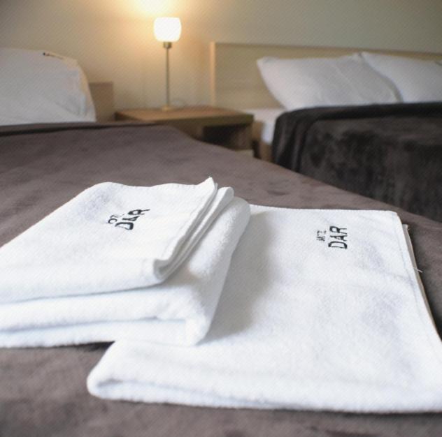 Postel nebo postele na pokoji v ubytování Motel & Restaurant Dar