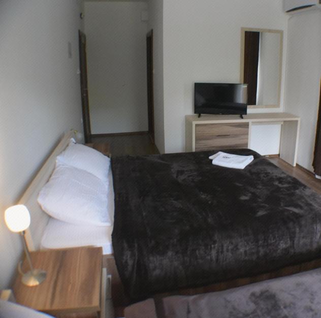 Postel nebo postele na pokoji v ubytování Motel & Restaurant Dar