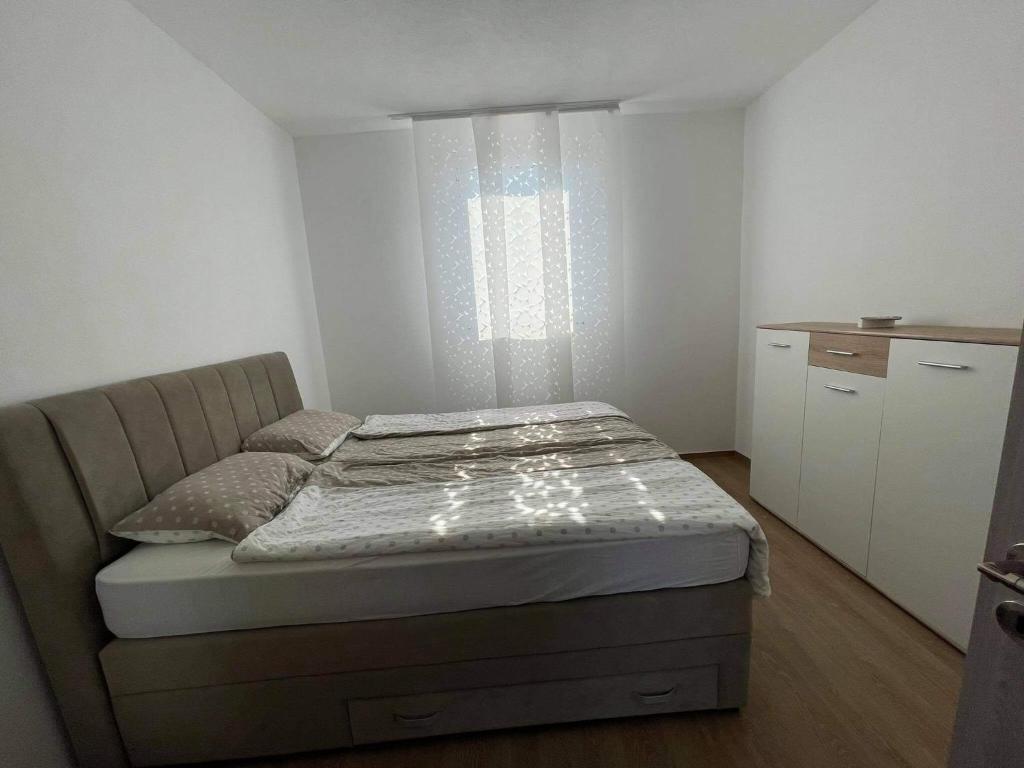 Postel nebo postele na pokoji v ubytování Kuča za odmor BACHUS