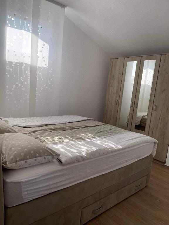 Postel nebo postele na pokoji v ubytování Kuča za odmor BACHUS