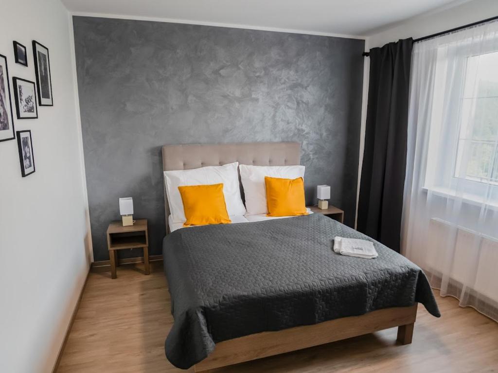 Postel nebo postele na pokoji v ubytování Wellness Apartmány Panorama