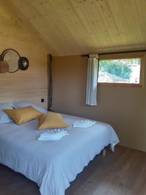 Postel nebo postele na pokoji v ubytování Les Mandarins
