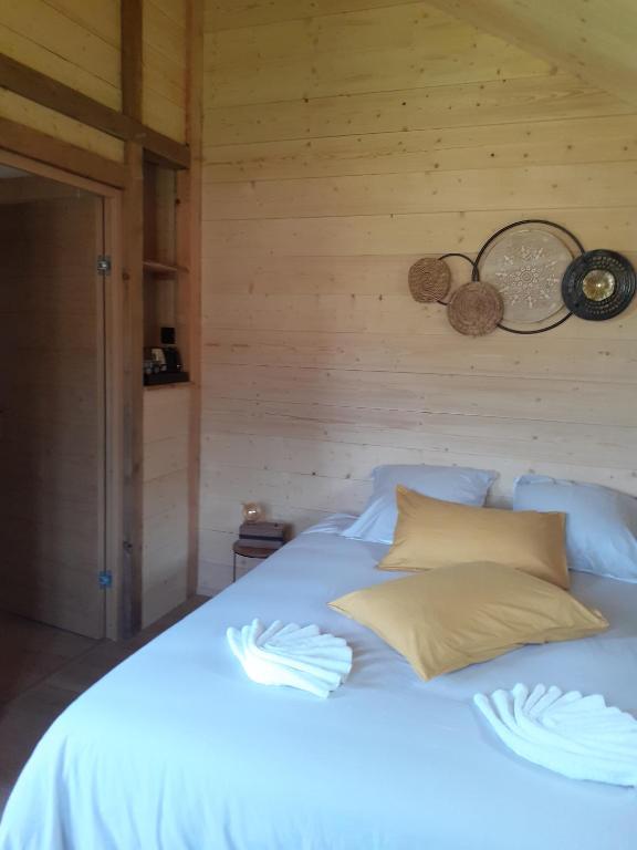 Postel nebo postele na pokoji v ubytování Les Mandarins