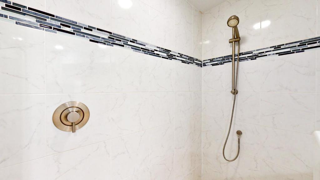 a shower with a shower head in a bathroom at 7645 Huntington Villa in Hilton Head Island