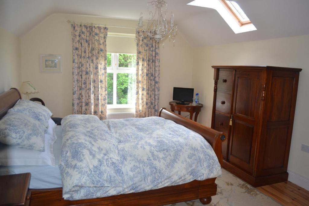 Postel nebo postele na pokoji v ubytování Guaire House Killarney