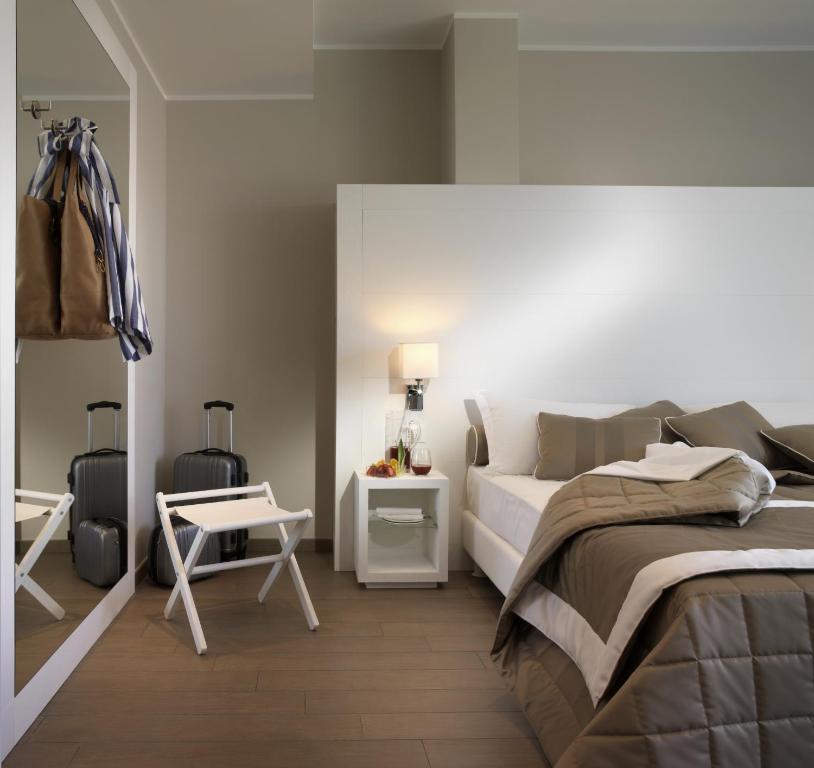 Postel nebo postele na pokoji v ubytování Hotel Biancamano