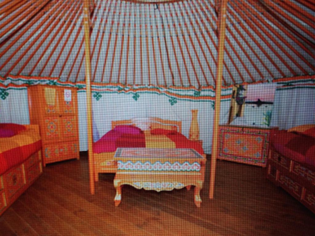 Postel nebo postele na pokoji v ubytování Camping Domaine de Mepillat