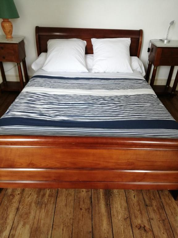 Letto o letti in una camera di MAISON ALBA LA SOURCE