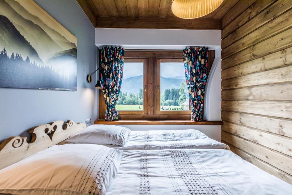 Posteľ alebo postele v izbe v ubytovaní PREMIUM Apartament Krokus - Giewont View