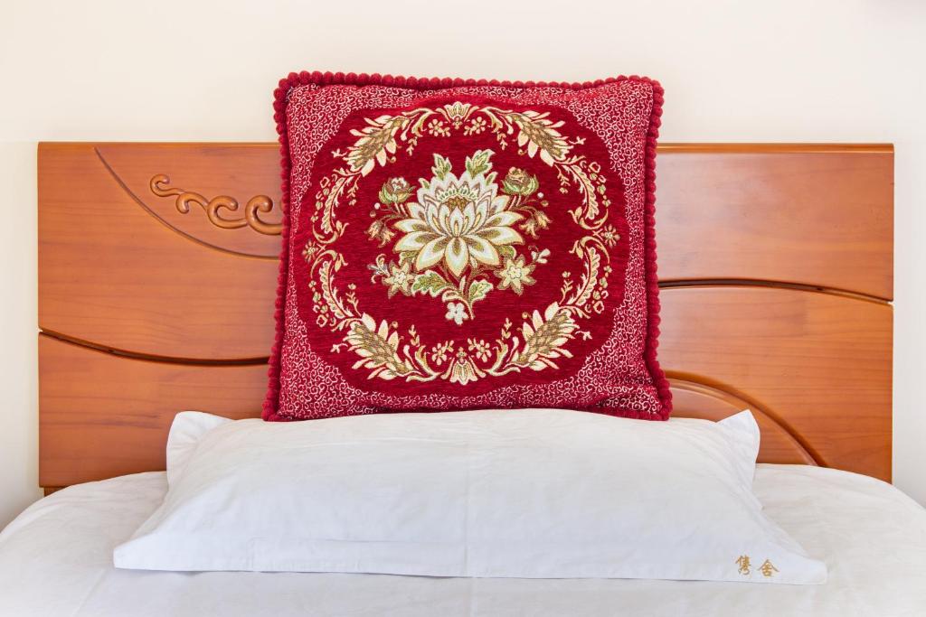 Postel nebo postele na pokoji v ubytování Junshe Boutique Guest House-Complementary pick up servie for a 3-night stay in a deluxe room