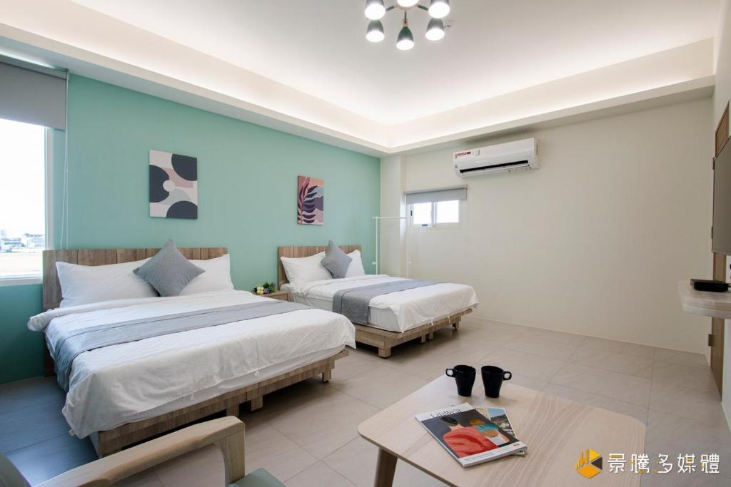 M2 Villa 泳池親子包棟民宿房間的床