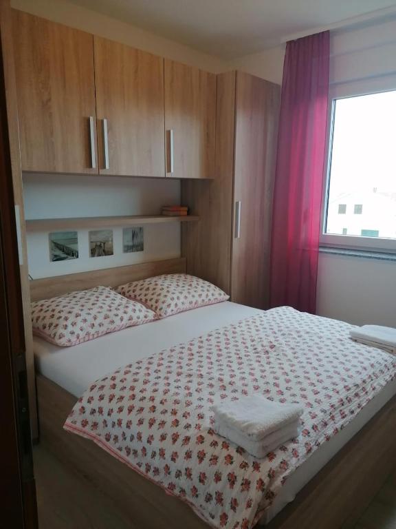 Postel nebo postele na pokoji v ubytování Apartman Mihalj Zadar-Rtina Miletici