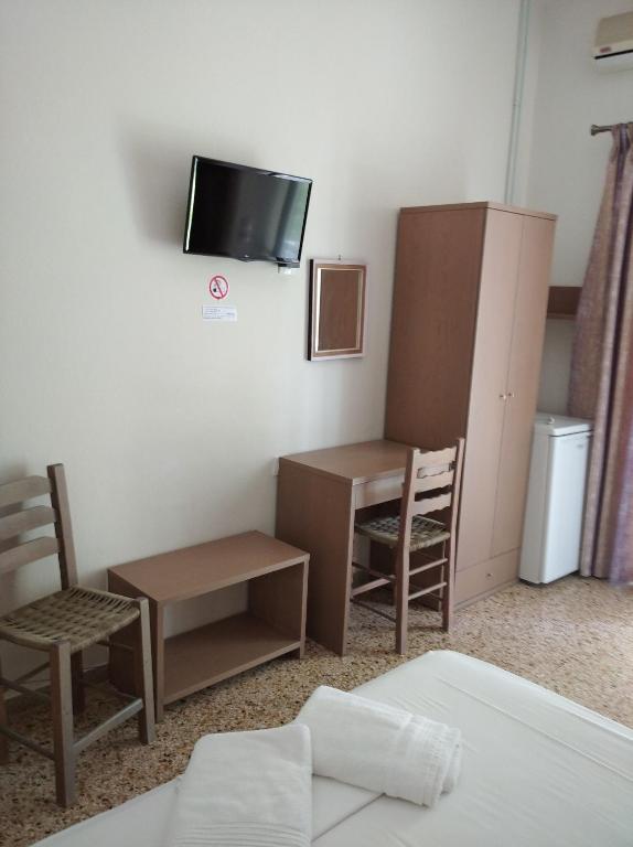 TV a/nebo společenská místnost v ubytování Hotel Ion