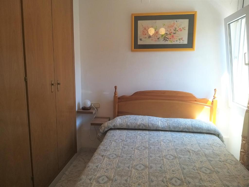 Postel nebo postele na pokoji v ubytování Margarida