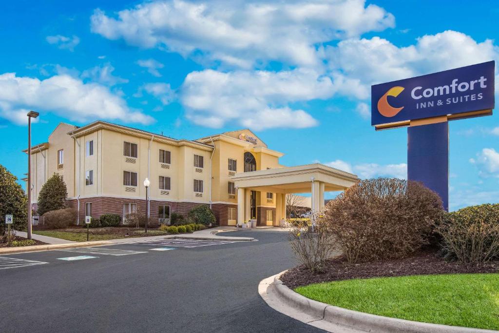 a hotel with a sign in front of a building at Comfort Inn & Suites in Brevard