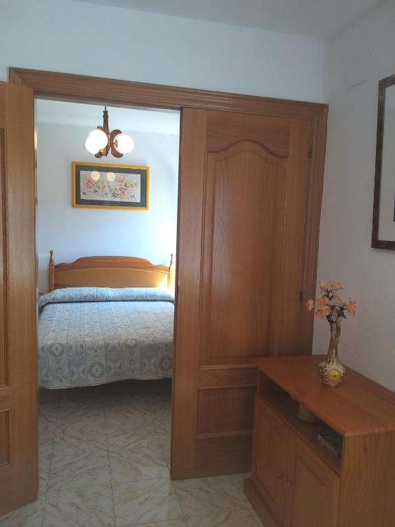 Postel nebo postele na pokoji v ubytování Margarida