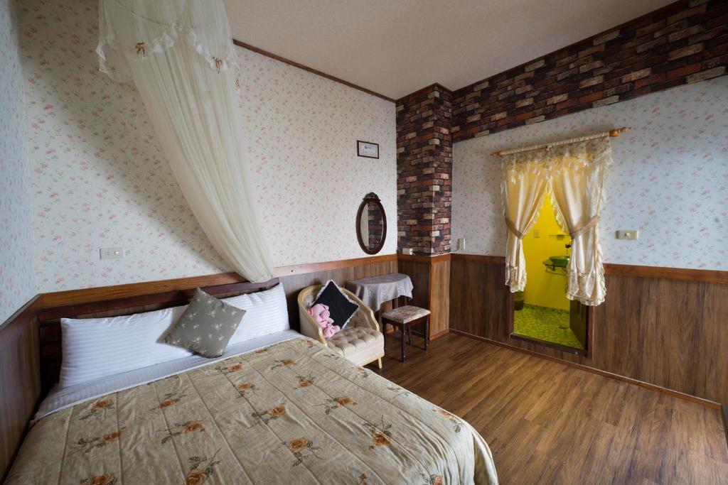 Postel nebo postele na pokoji v ubytování Puli Town B&B