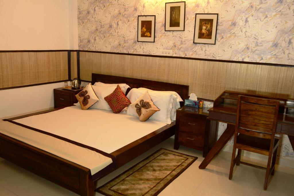 Postel nebo postele na pokoji v ubytování House of Comfort Noida