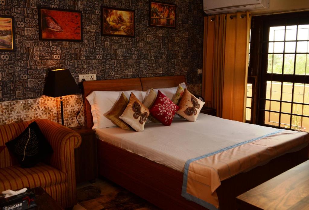 Postel nebo postele na pokoji v ubytování House of Comfort Noida