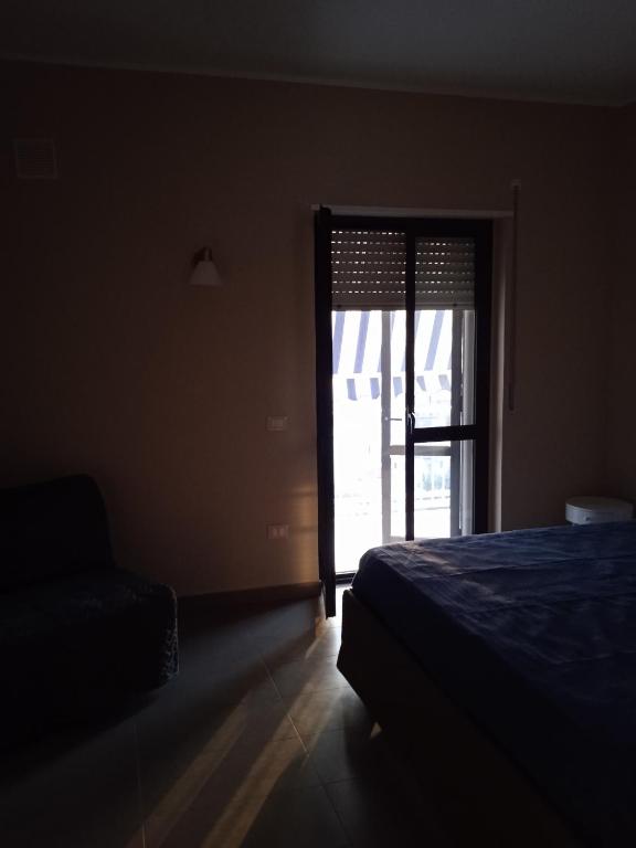 Postel nebo postele na pokoji v ubytování Le Zagare b&b