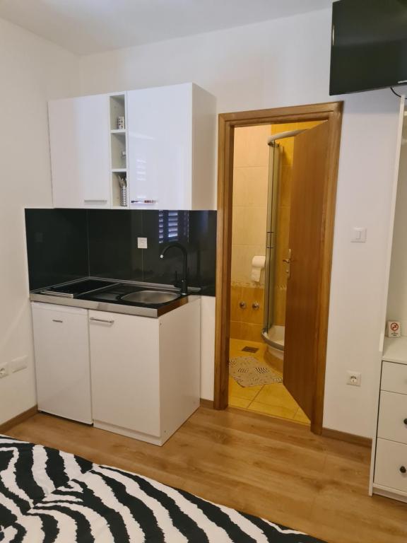 Koupelna v ubytování Apartments Petrovic