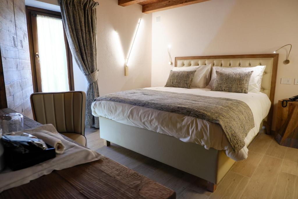 Postel nebo postele na pokoji v ubytování Maison Bertin