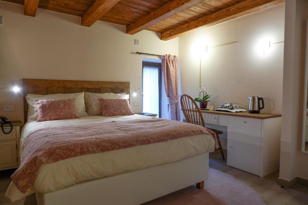 Postel nebo postele na pokoji v ubytování Maison Bertin