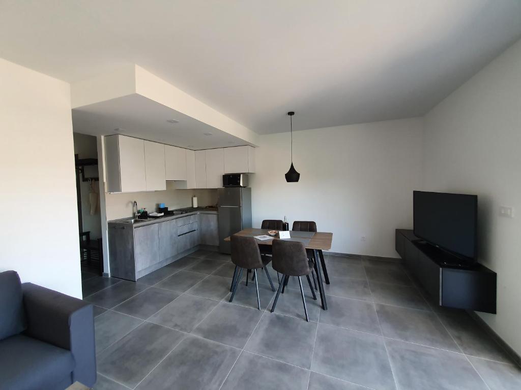 Kuchyň nebo kuchyňský kout v ubytování Apartmani Nerium