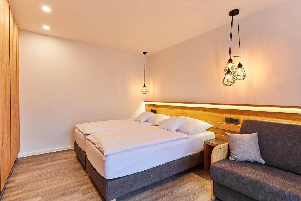 Postel nebo postele na pokoji v ubytování Resort Sněžné AMANITA