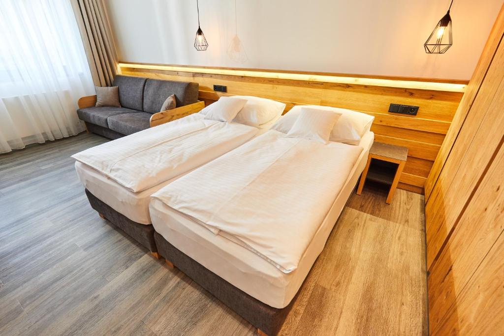 Postel nebo postele na pokoji v ubytování Resort Sněžné AMANITA