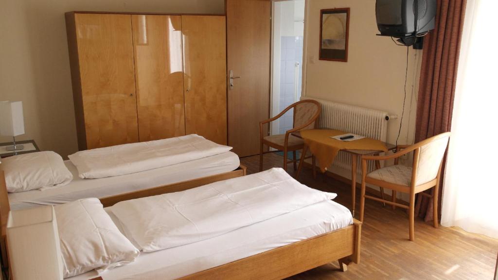 Posteľ alebo postele v izbe v ubytovaní Landhaus Waldfrieden
