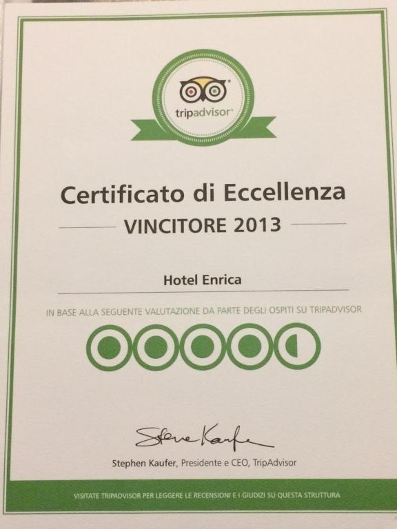 Um certificado, prémio, placa ou documento mostrado em Albergo Enrica