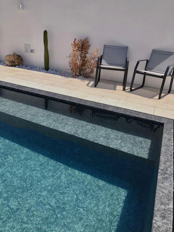 The swimming pool at or close to Appartamento Magnolia Deluxe