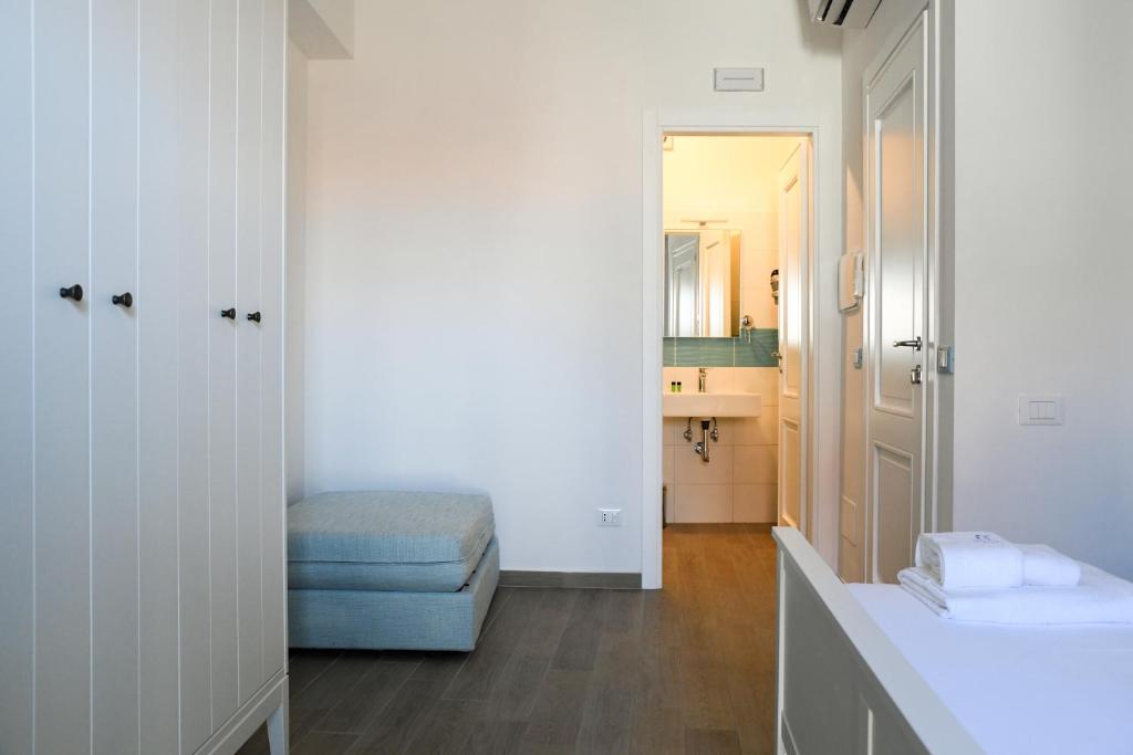 Postel nebo postele na pokoji v ubytování Signora Tita B&B Chianalea - Scilla