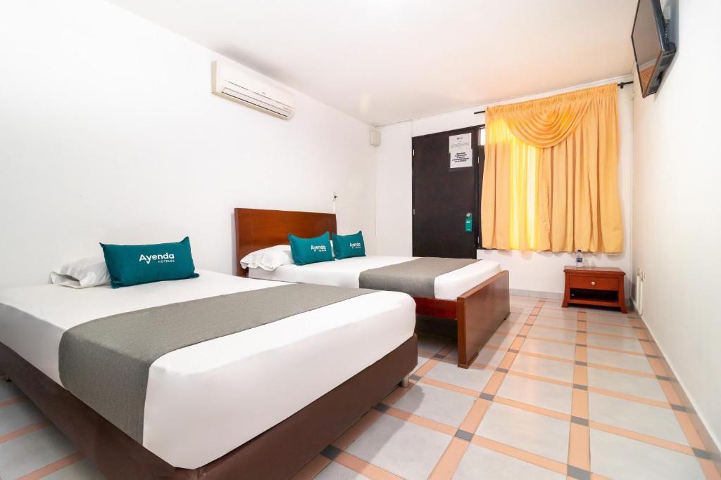 Ayenda Oporto Suites - Standard Quadruple Room