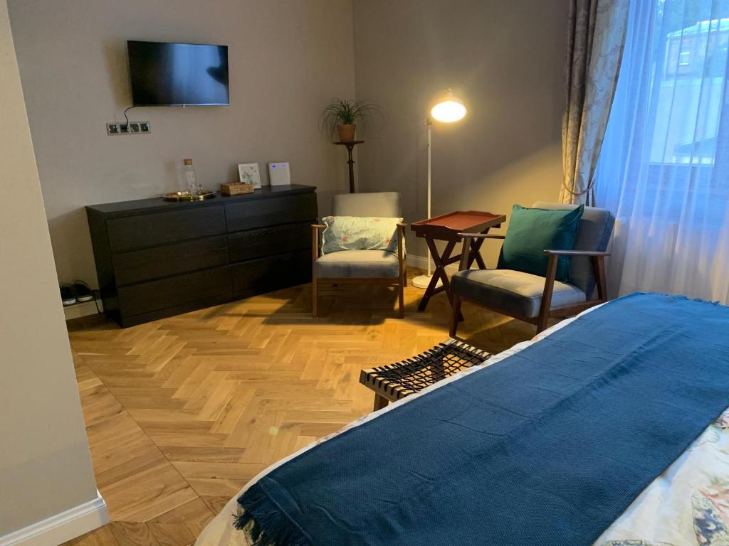 Postel nebo postele na pokoji v ubytování Emily