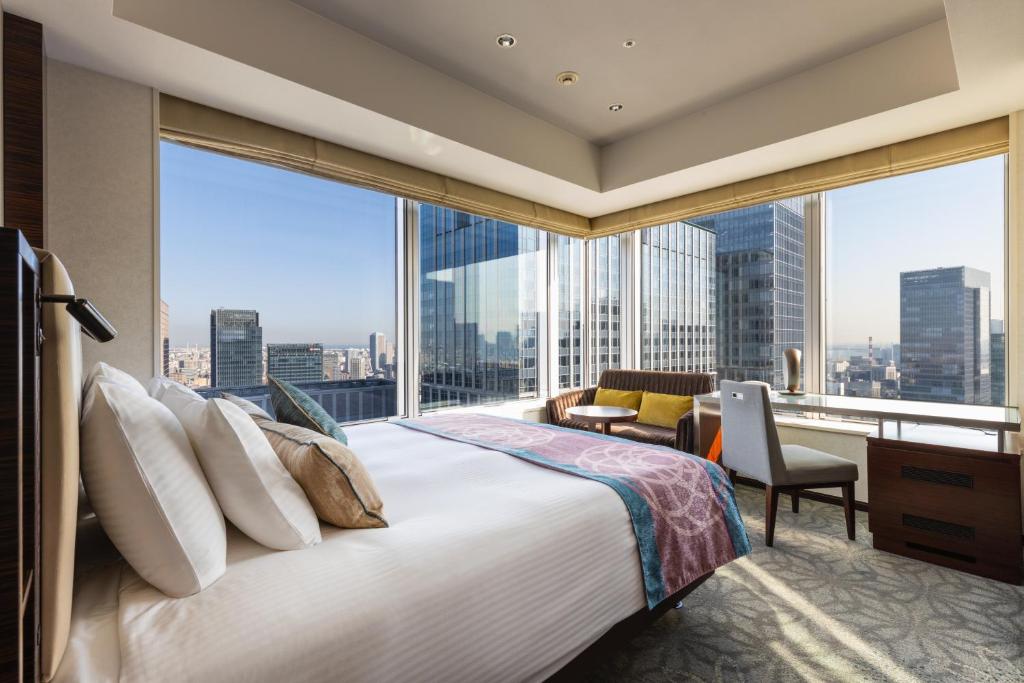 Postel nebo postele na pokoji v ubytování Hotel Metropolitan Tokyo Marunouchi