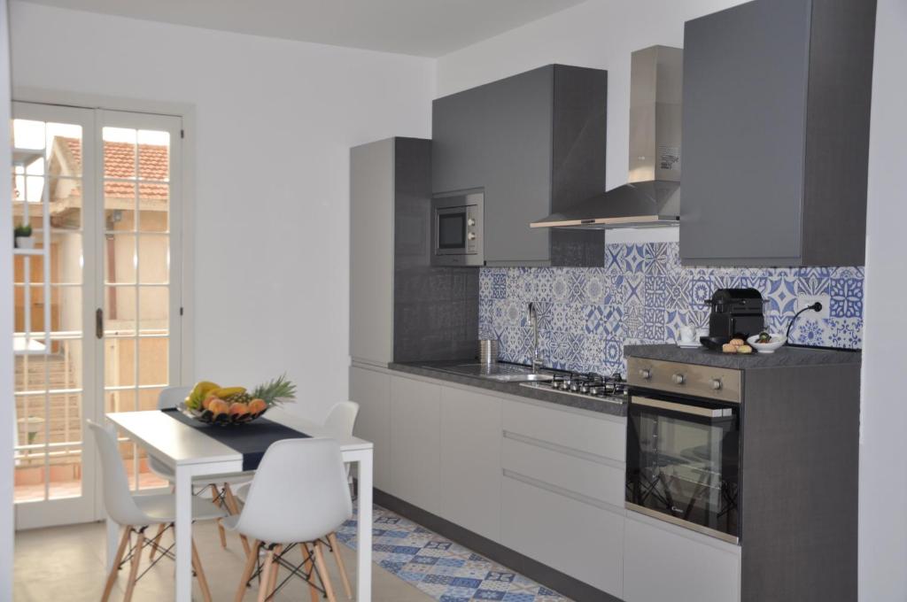 Kuchyňa alebo kuchynka v ubytovaní Petals casa vacanze